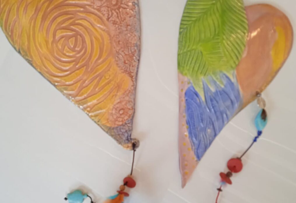 Corazon y plumas by Kim Bagatto